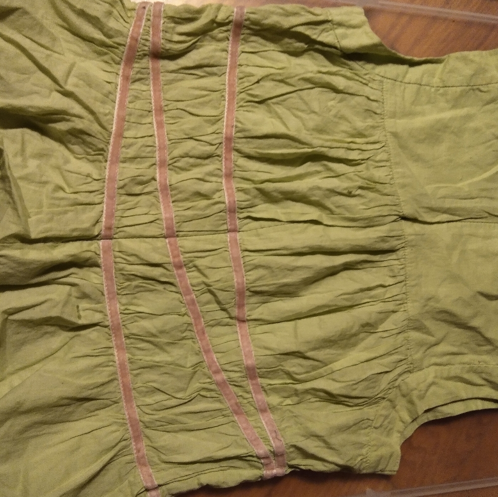 Green blouse with pink velvet ribbon